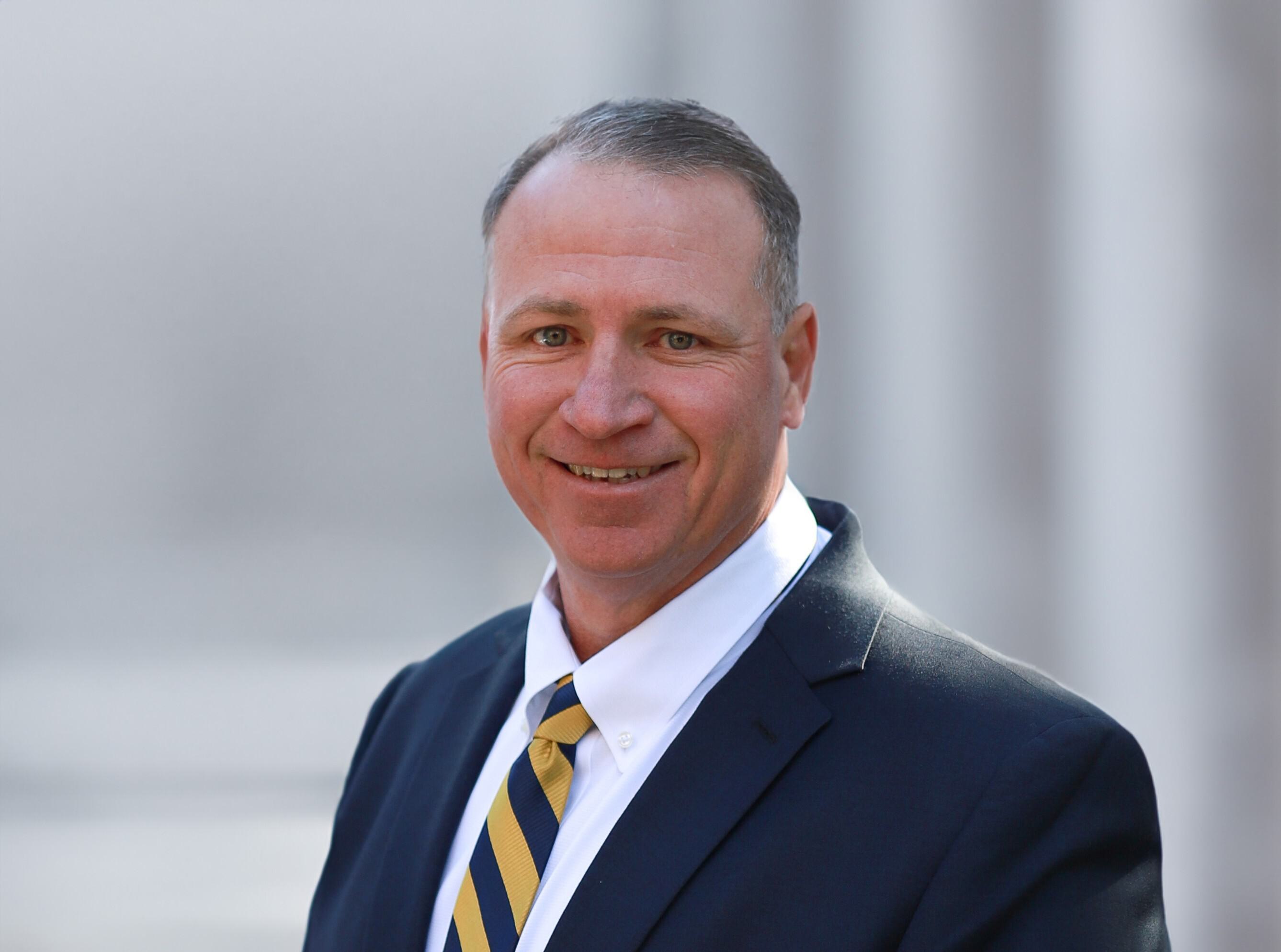 Headshot of NWI's CEO, Myron Lambert