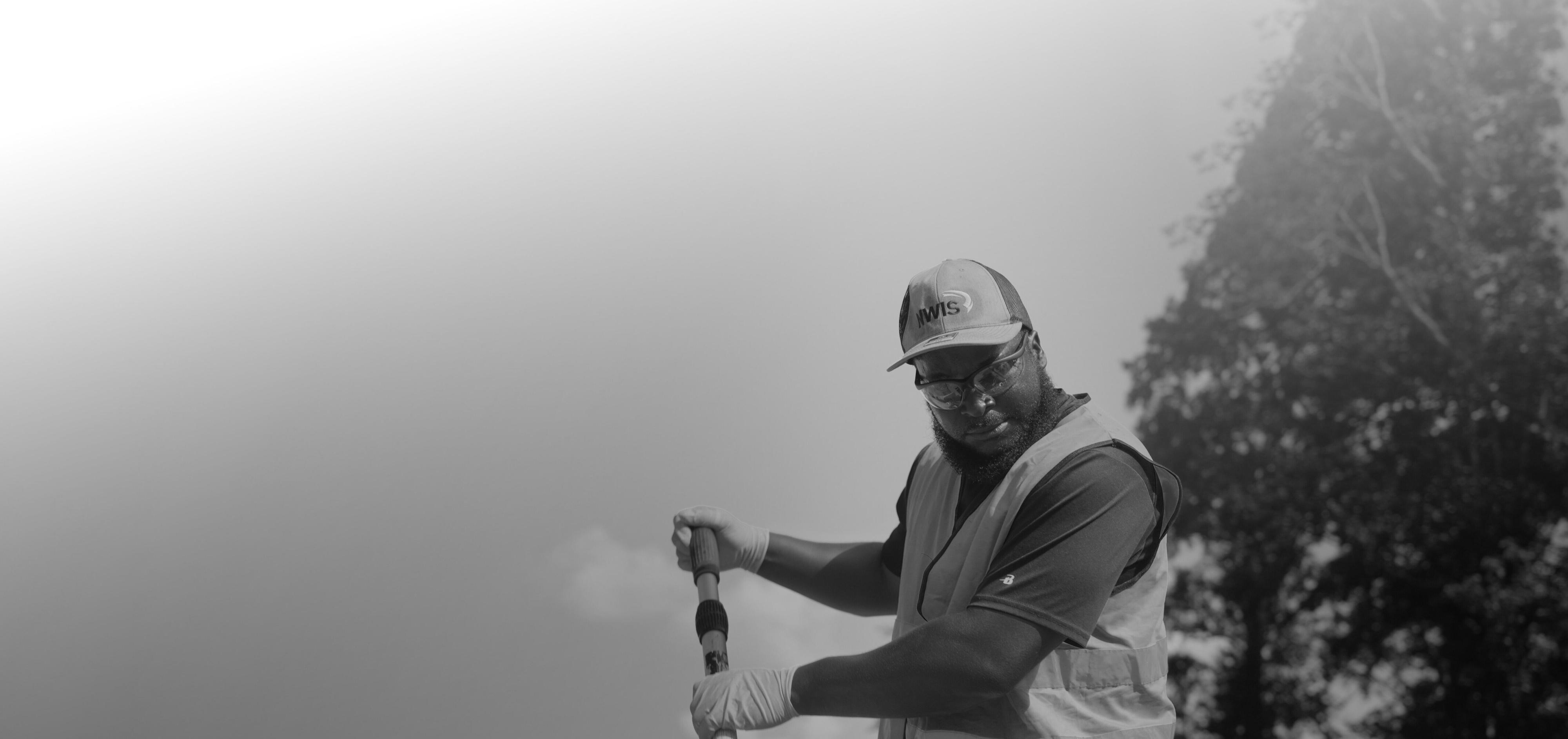 National Water Institute worker digging