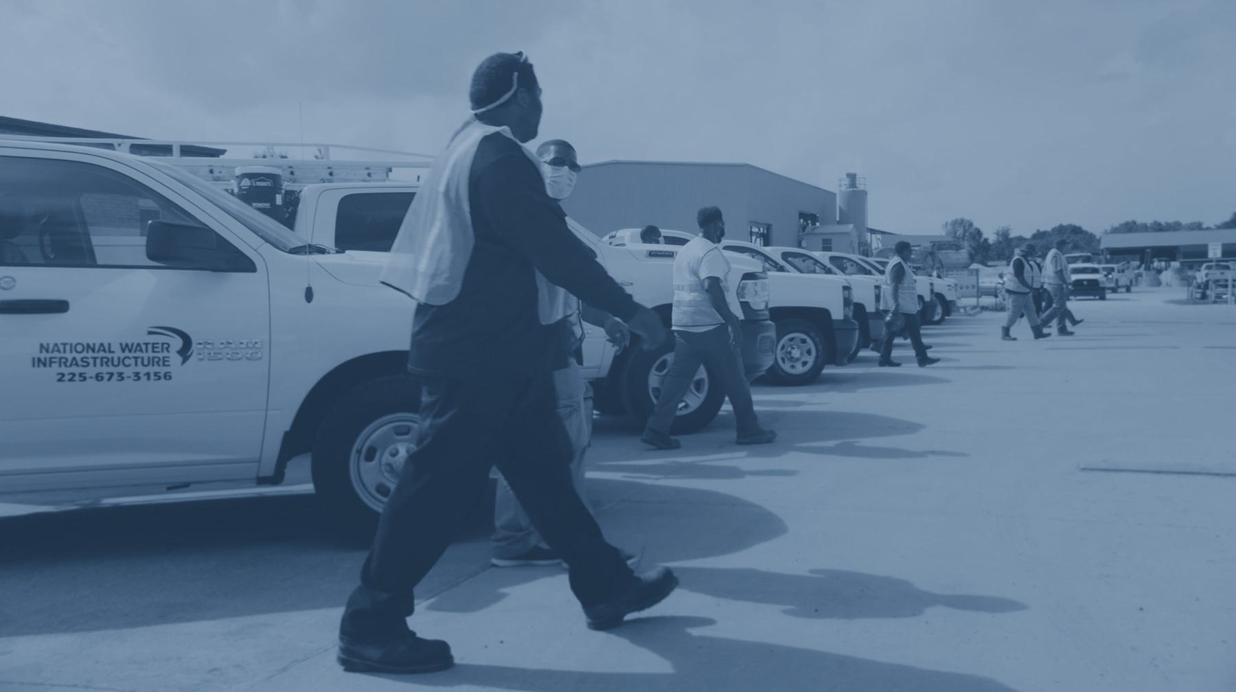 Employees Walking in Parking Lot